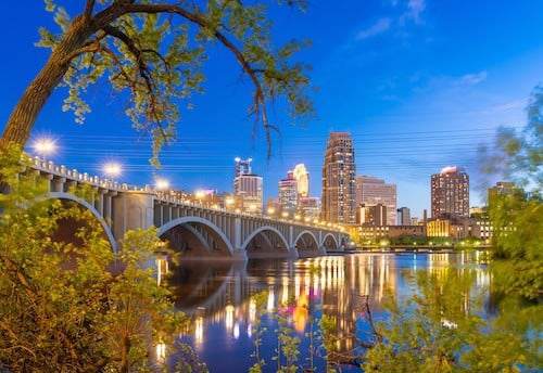 Minnesota, USA downtown skyline on the Mississippi River with the Third Avenue Bridge