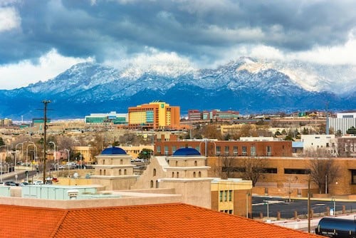 View of distant mountains and buildings in New Mexico