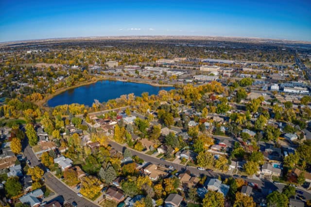 An aerial view of Thornton, a suburb of Denver, captured during the autumn season.