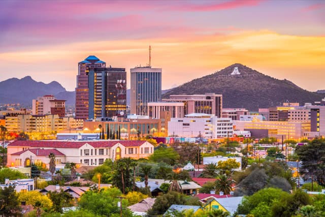 Tucson downtown city skyline with mountains at twilight